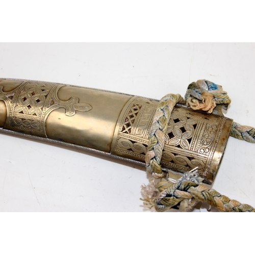 1050 - Moroccan Jambiya in white metal sheath of unusual large proportions, approx 56cm