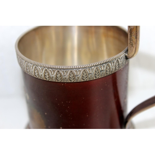 1127 - An extremely unusual Russian silver mug with hand painted or lacquer decoration depicting horses pul... 