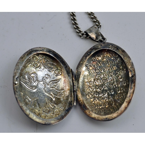 1232 - Hallmarked silver chain with large locket engraved with doves of peace