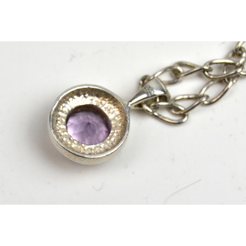 1249 - Silver chain with purple stone