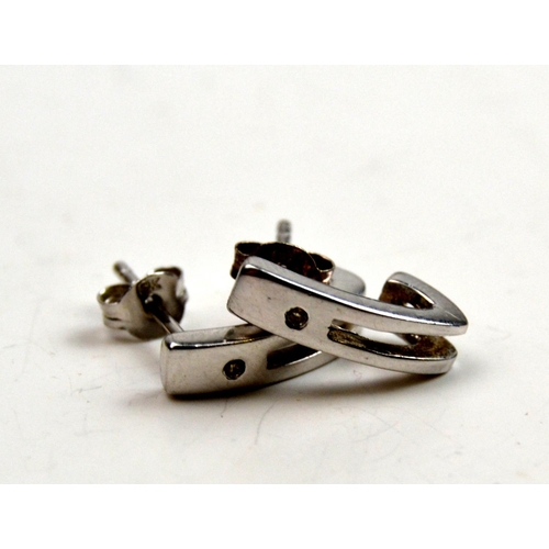 1283 - Pair of silver and diamond stud earrings