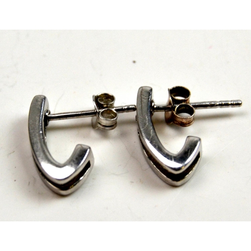 1283 - Pair of silver and diamond stud earrings