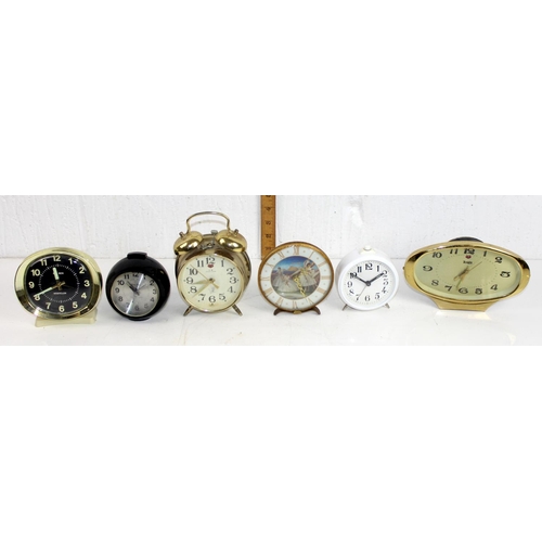 1393 - 25 assorted vintage and later alarms clocks etc