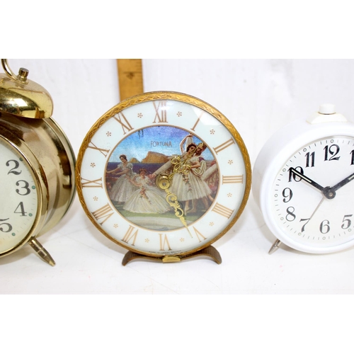 1393 - 25 assorted vintage and later alarms clocks etc