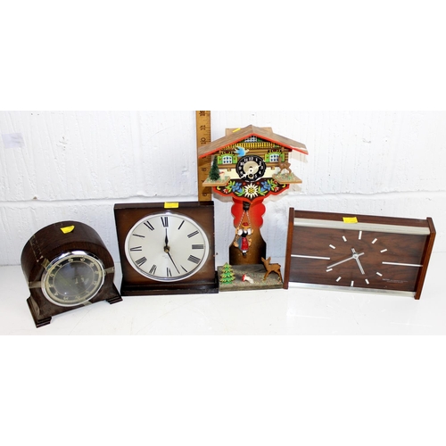 1399 - 8 assorted vintage and later clocks and a clock case