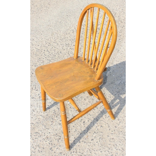 104 - A set of 6 War Department stickback dining chairs