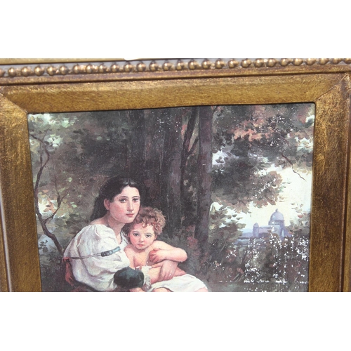 370 - An impressive gilt framed print of a mother & 2 children