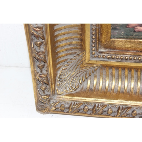 370 - An impressive gilt framed print of a mother & 2 children