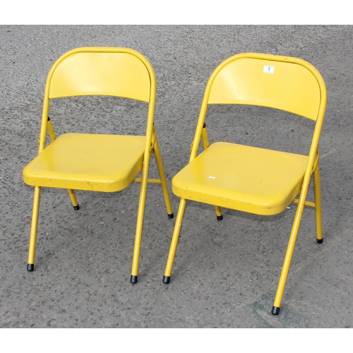 5 - A pair of Habitat folding yellow metal chairs