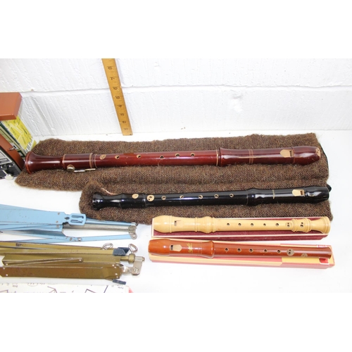 550 - Qty of musical related items to inc German made wooden recorders and a Wittner metronome