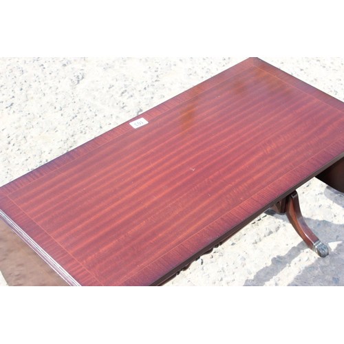 69 - Mahogany drop flap coffee table