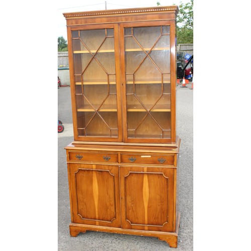 116 - A 20th century Yew wood veneered astral glazed display cabinet with cupboard base 4/4