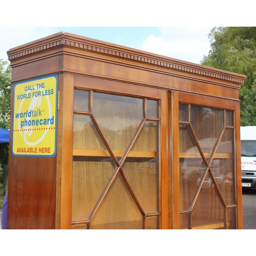 116 - A 20th century Yew wood veneered astral glazed display cabinet with cupboard base 4/4