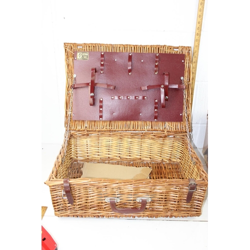 275 - Wicker picnic basket and a cherub decorated storage box