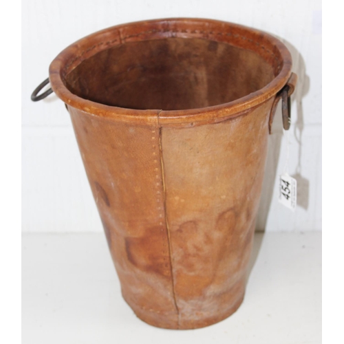 454 - A pair of leather planter buckets