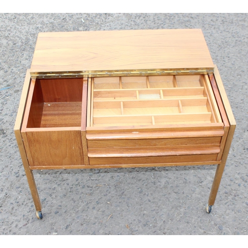 105 - 1960’s Danish Designer teak sewing/work box with fitted interior, two drawers and lift up lid on ret... 