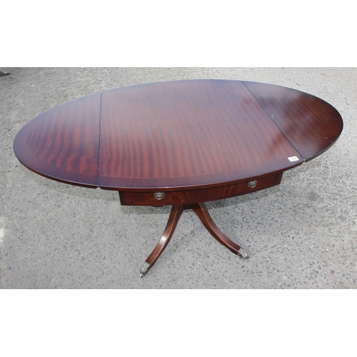 124 - Strongbow Furniture dropleaf table