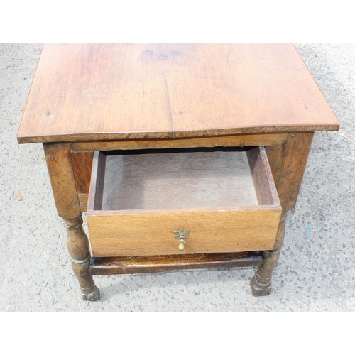 21 - An interesting Oak refectory table with drawer with later top and early base