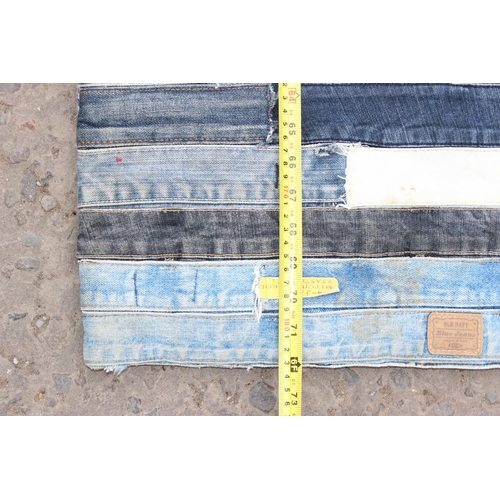 211 - An unusual rug made from Denim jeans