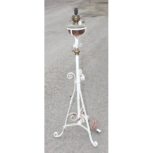 251 - Converted oil lamp on wrought-iron tripod stand