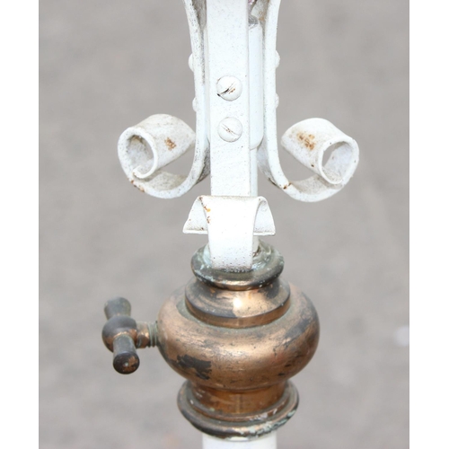 251 - Converted oil lamp on wrought-iron tripod stand