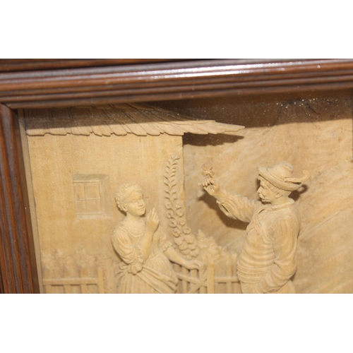 311 - Joseph Graber of Innsbruck, a late 19th century lime wood diorama carved in relief depicting a male ... 