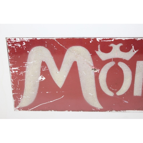 331 - A vintage painted metal Monarch advertising sign in later frame