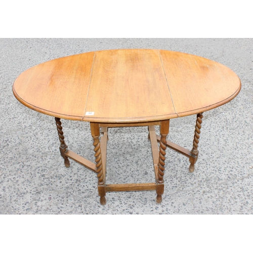 59 - Vintage Oak drop leaf table with barley twist legs