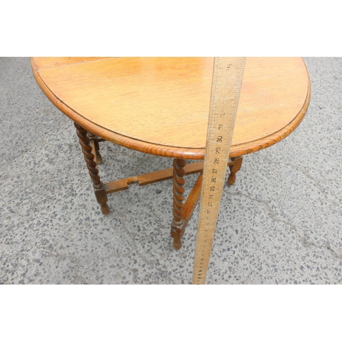 59 - Vintage Oak drop leaf table with barley twist legs