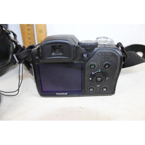 611 - A Fujifilm Finepix S8100 digital camera in case