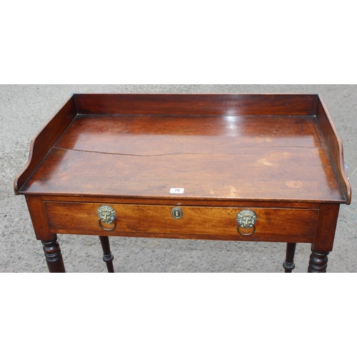 70 - A Victorian mahogany desk with drawer and lion head handles