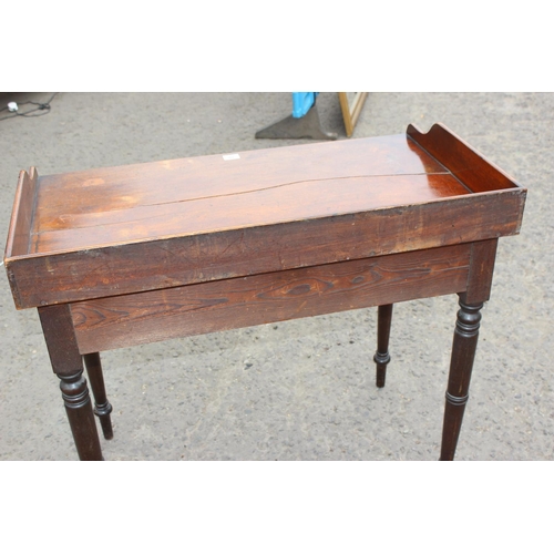 70 - A Victorian mahogany desk with drawer and lion head handles