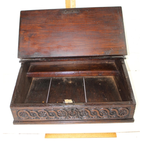 99 - A 17th/ 18th century carved wooden bible box with iron hinges