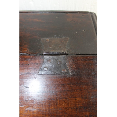 99 - A 17th/ 18th century carved wooden bible box with iron hinges