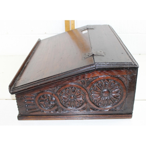 99 - A 17th/ 18th century carved wooden bible box with iron hinges