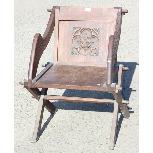 158 - An unusual antique oak Gothic style armchair with carved detail - Sold on behalf of Island Farm Donk... 