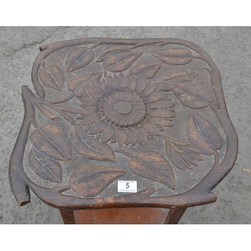 5 - An Arts & Crafts period carved oak side table