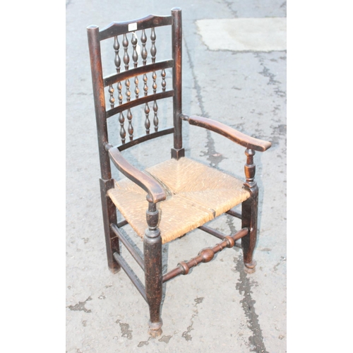 84 - Antique Lancashire type country open armchair with rush seat