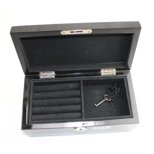 271 - A modern black wooden and mirrored jewellery box with key