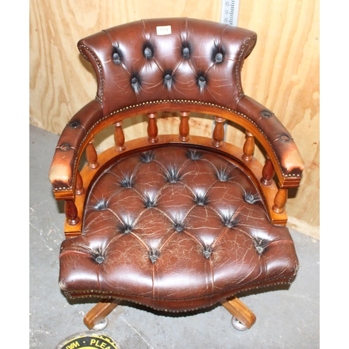 119 - Leather button backed red/ brown leather captain's style desk chair