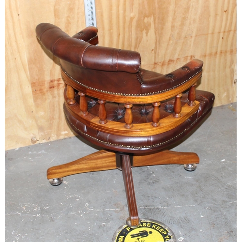 119 - Leather button backed red/ brown leather captain's style desk chair