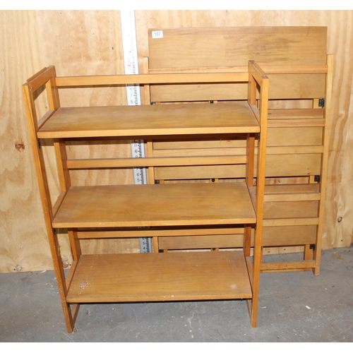 137 - A pair of folding lightwood shelves, ideal for antiques fairs