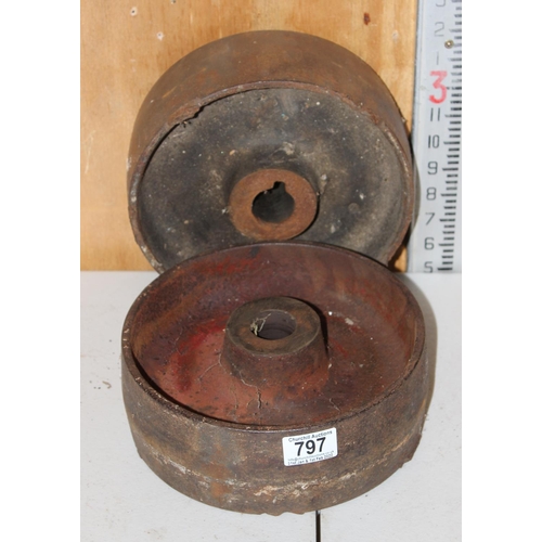 797 - A pair of cast iron pulley wheels