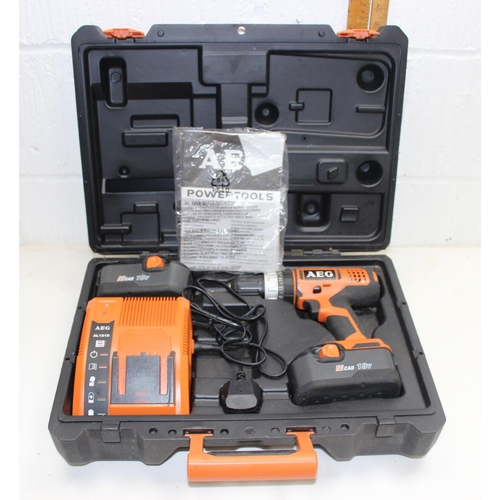 825 - AEG battery drill and 2 batteries in box