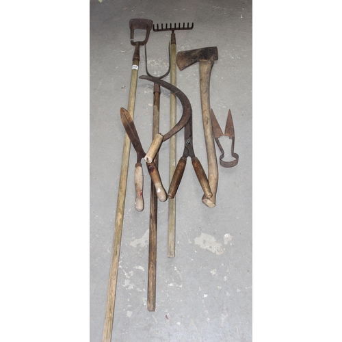 854 - Qty of wooden handled garden tools