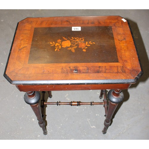 165 - A Victorian mahogany sewing table with turned legs and a floral marquetry inlaid top