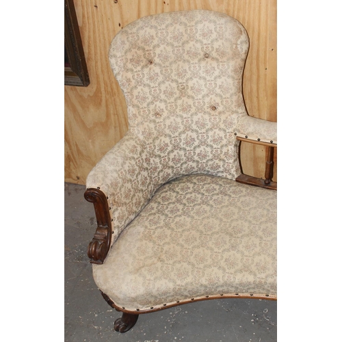 16 - Antique mahogany framed conversation couch with button back upholsters, likely 19th century