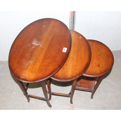 107 - Vintage Oval nest of 3 tables