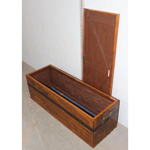 115 - Large varnished wooden trunk