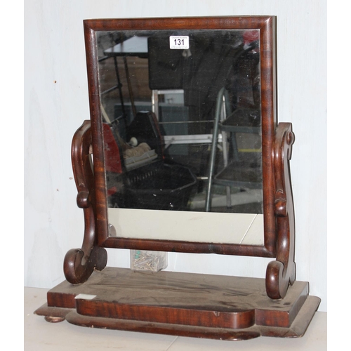 131 - Antique table top mirror on stand